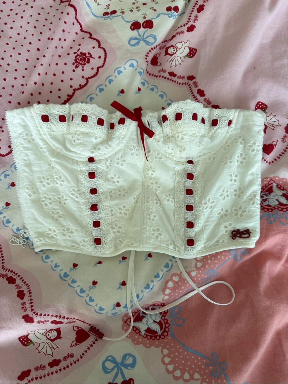 White Eyelet Corset Top with Red Ribbon Accents